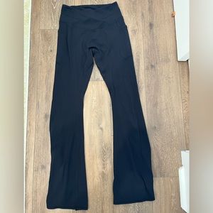 free people movement black flared leggings with slit in back size small